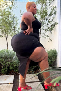 Huge Black Booty Onlyfans Model in black dress
